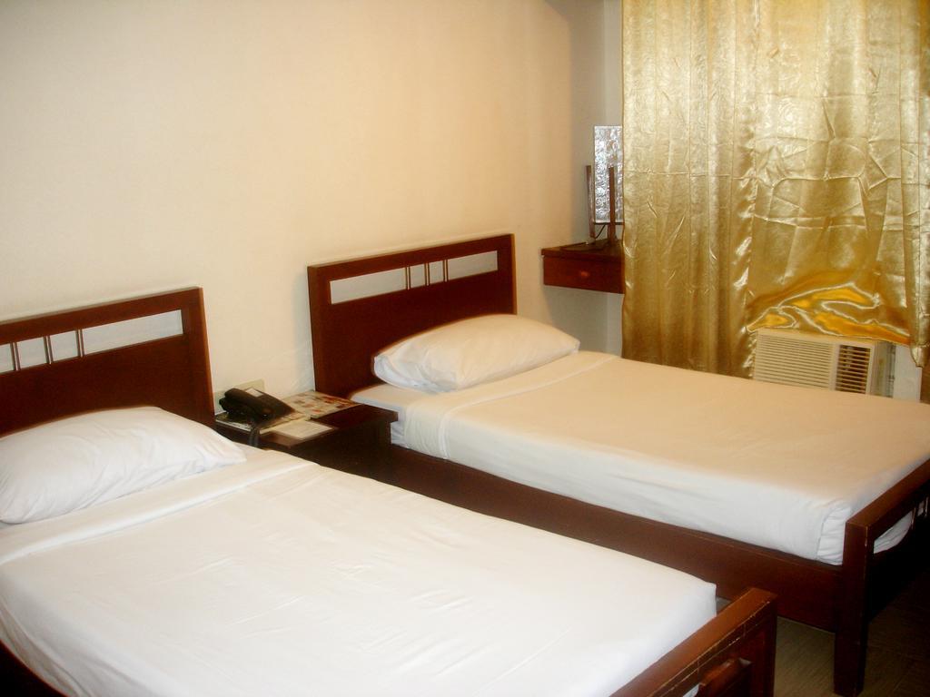 Roxas Midtown Hotel Bilik gambar
